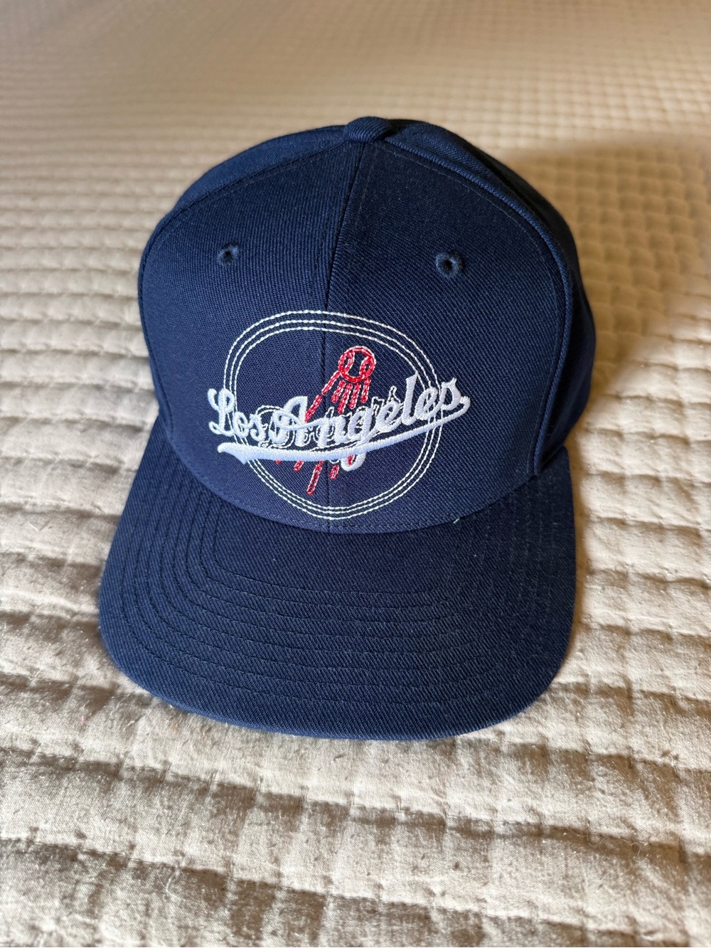 Mitchell & Ness Navy Los Angeles Snapback Hat with White Script and Red Detail